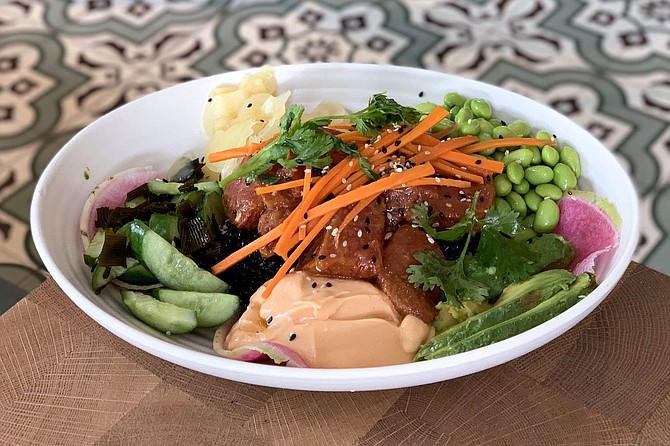 A vegan poke bowl made of watermelon instead of raw fish