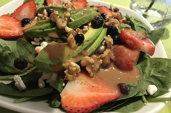 Walnuts, avos, and a fruity vinaigrette work their way into salad