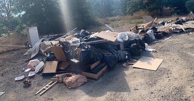 On August 8, somebody drove back to the property and picked up the bathroom remodel debris.