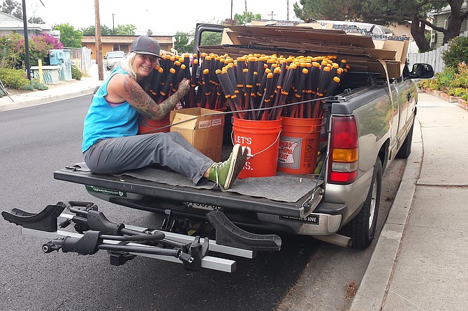 Cindy Lapio, aka "The Quake,"  loads some canyon-cleaning tools into “The Pewter Dragon.”