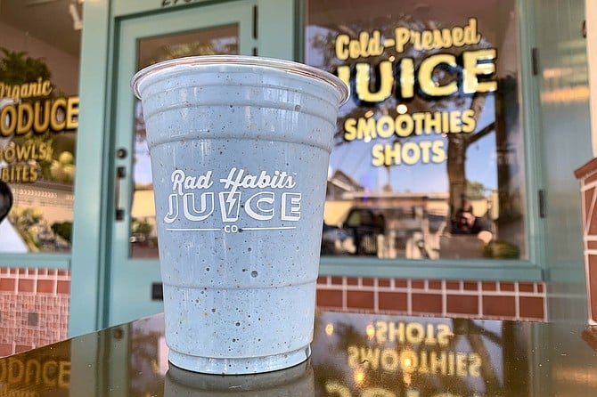 Blue spirulina brings color to the banana, almond milk, and bee pollen smoothie.
