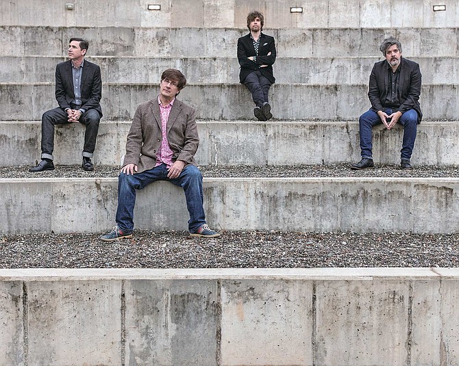 The Mountain Goats muse on aging wizards and possibly the jeans-and-sport-coat look.