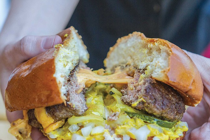 The Juicy Lucy at Del’s Hideout is stuffed with American cheese so it explodes like a cheese grenade when you bite it, which is weirdly better than cheese melted on top.