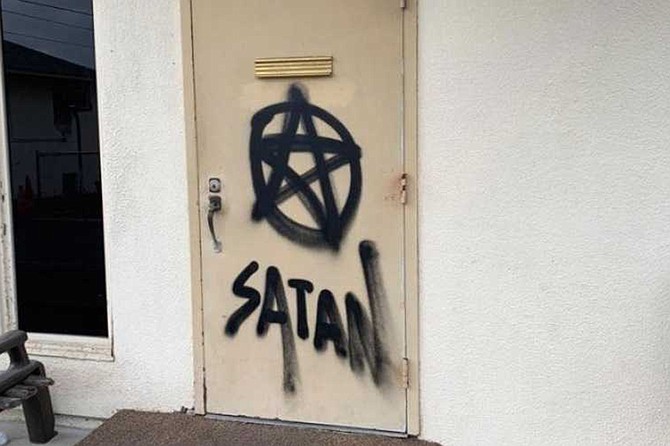 “At least the vandal signed his work,” said Pastor Huizar.