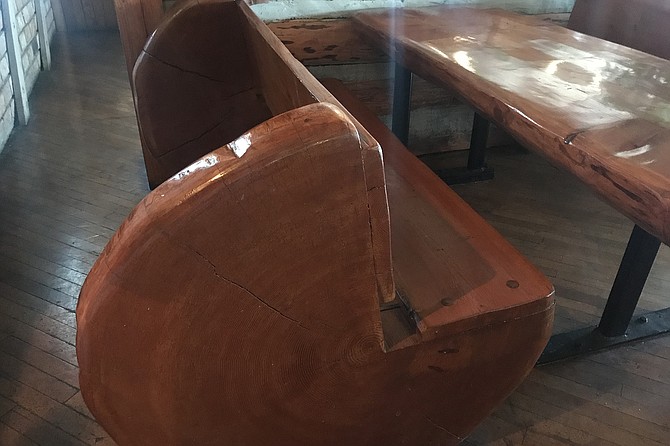 This old-growth timber furniture weighs a ton, lasts forever.