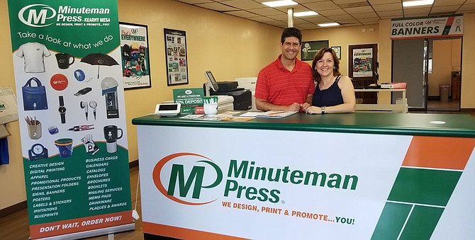 Elaine Bertoni (right) owns the Minuteman Press franchise in Kearny Mesa.