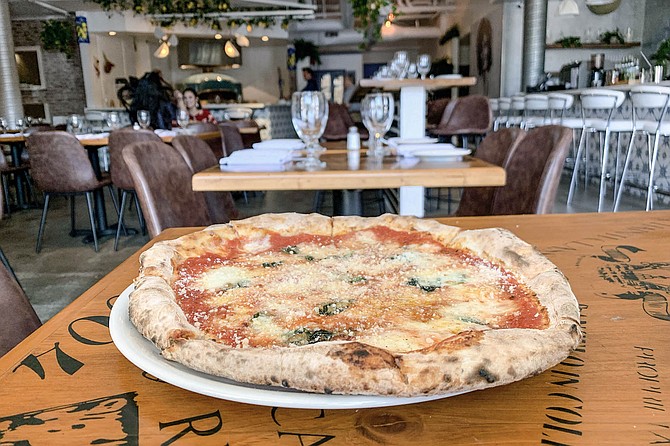 Margherita pizza in a Neapolitan restaurant