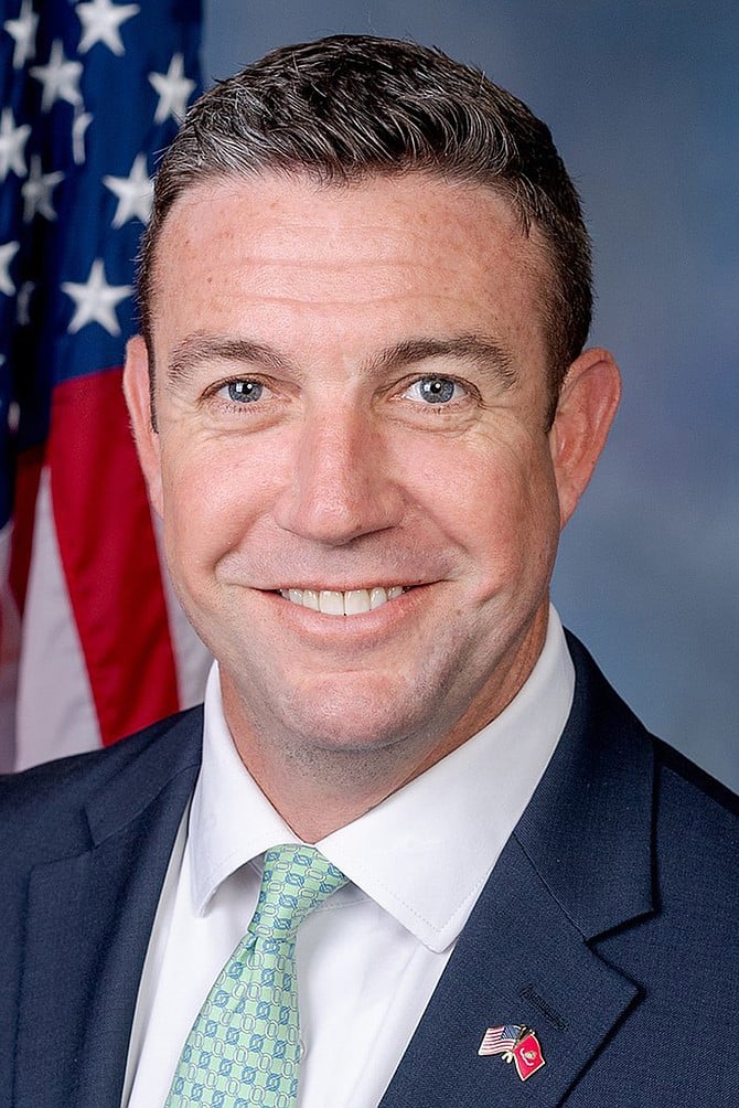 Duncan Hunter. Is that a smile or the rictus of a political dead man?