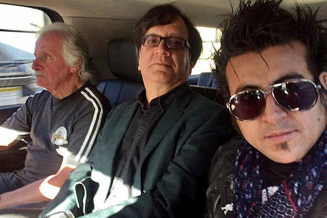 Besties: San Diego rockers (right to left) Chris Leyva and Bart Mendoza ride with original Beatles drummer Pete Best. Leyva served as model for a statue of original Beatles bassist Stuart Sutcliffe.