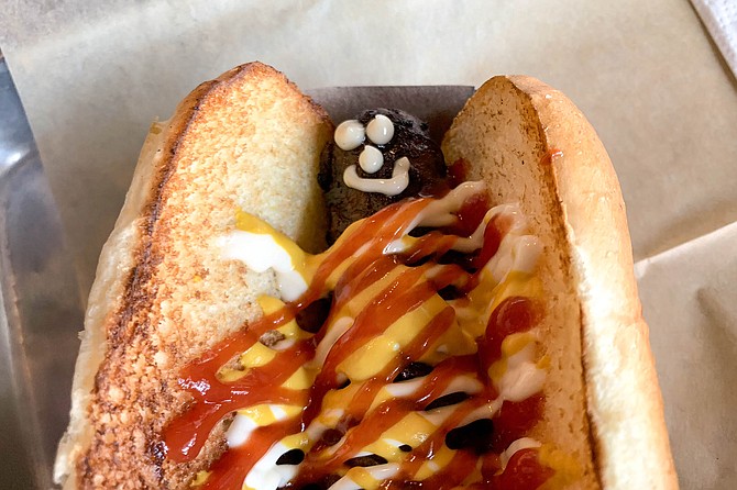 Despite the smiling condiments, La Virgen is the plainest hot dog served at Barrio Dogg.
