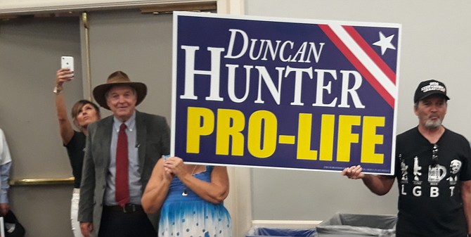 Former Congressman Duncan Hunter, the current congressman's father, on left wearing hat