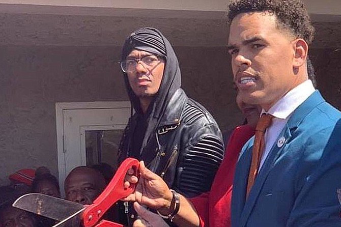 When The People’s Alliance for Justice, headed by Rev. Shane Harris (right), opened offices in Southeast San Diego, Nick Cannon lent his celebrity to the proceedings. “Monet” questions why Harris, instead of demanding justice for her and other victims at Lincoln, invited their alleged victimizer’s pal Cannon to the opening.