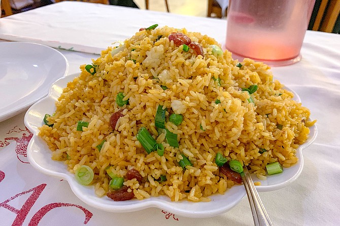 A heaping pile of fried rice cooked for a Mexican palate