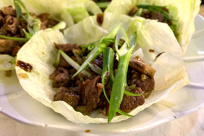 Duck lettuce wraps, billed as “lettuce tacos”