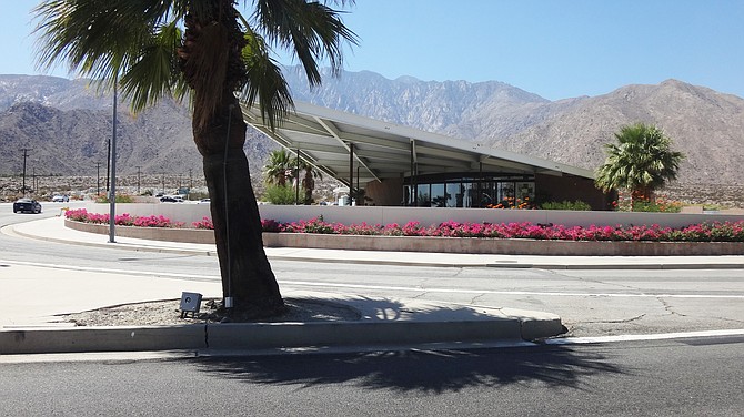 Palm Springs Visitors Center on N. Palm Canyon Drive at Tramview Road.  Many years ago the building was a gas station. Photographed in September 2013.