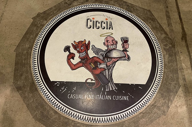The painted floor medallion at Ciccia Osteria