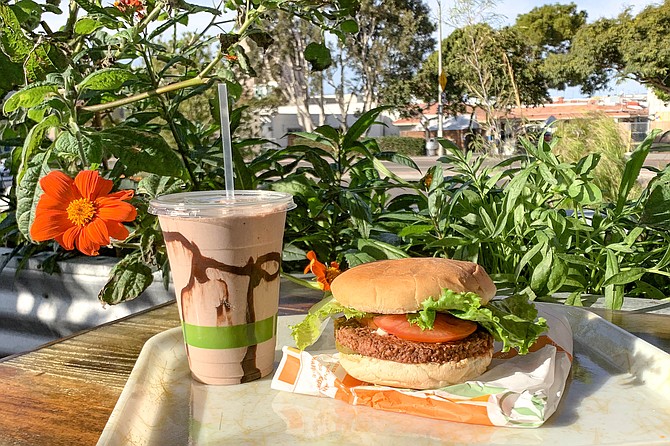 Nondairy chocolate shake and vegan hamburger