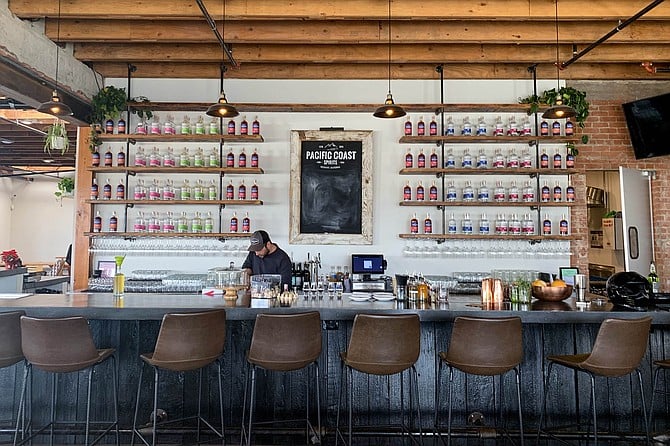 Pacific Coast Spirits serves food, so there are no limits to ordering spirits at the bar.