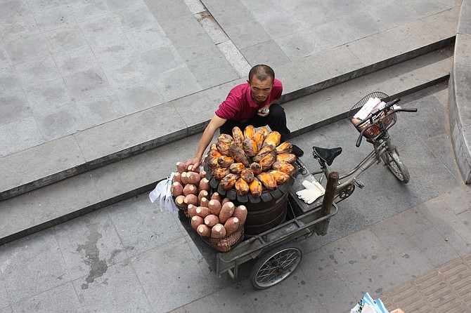 Roasted sweet potato street vendor in Chaoyang District of Beijing