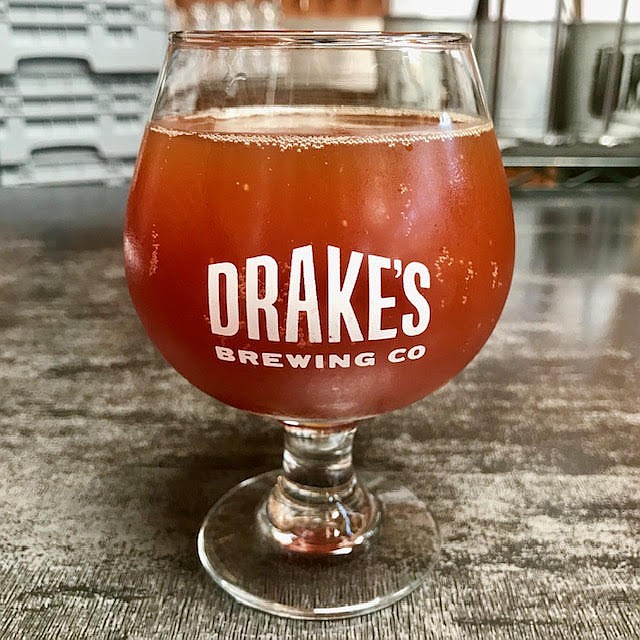 A beer at Drake's Dealership.