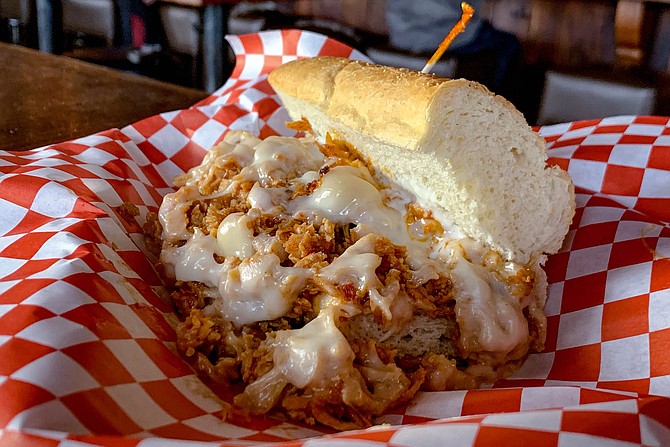 A buffalo chicken cheesesteak, with provolone and ranch dressing