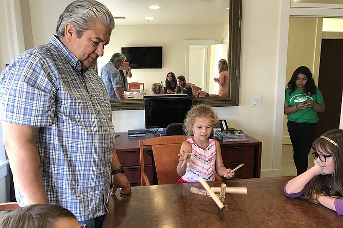 Katie, 5, picks the game up quickly at the Coronado Historical Society. Michael Connolly Miskwish supervises