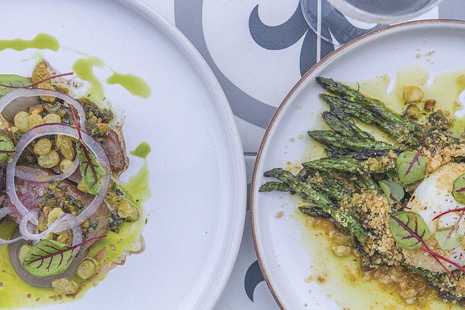 Pan roasted lamb striploin and grilled asparagus, both featuring pistachio aillade, at Lionfish.