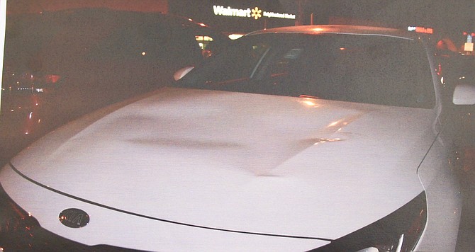 Evidence photo of KIA damaged hood. “This isn’t Miss Goodbrand’s first rodeo."