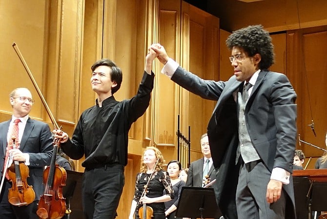 Standing ovation for great music and lively performances.
San Diego Symphony conductor, Rafael Payare with Stefan Jackiw, violinist.

Photography is allowed during applause.
