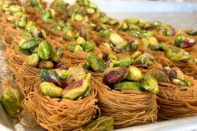 Bird nest like kadaif (shredded phyllo dough) pastries filled with candies pistachios