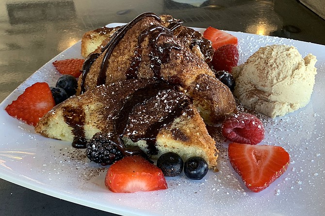 Tiramisu inspired brioche french toast, with chocolate, berries, and honey espresso marscarpone