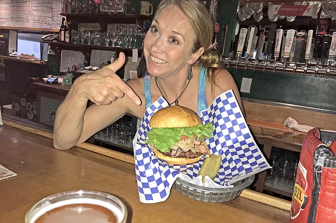 Barkeep Kimberly makes sure we appreciate the ham-burger.