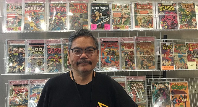 Stan Agbulos and a sample of his Kirby collection.