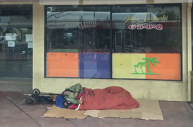 Homeless squatter camped out on the corner of 30th Street and University Ave during the Coronavirus state of emergency.