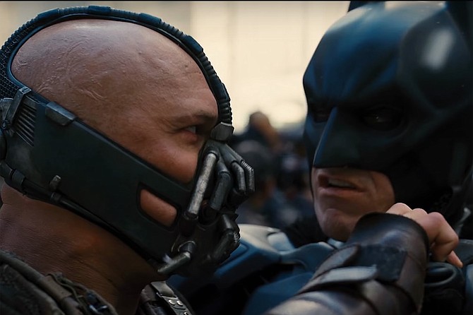 In Troller’s redubbed, retooled version of Christopher Nolan's The Dark Knight Rises, the brave hero Bane, equipped with a specially designed respirator mask that protects him from Bat-Man’s plague attack, does battle with the Cowled Crusader against Humanity.