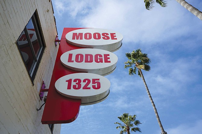 “A group of us was standing outside at 2 in the morning, looking at that giant Moose Lodge sign, all lit up, and we said, ‘We have to do something about this place.’”