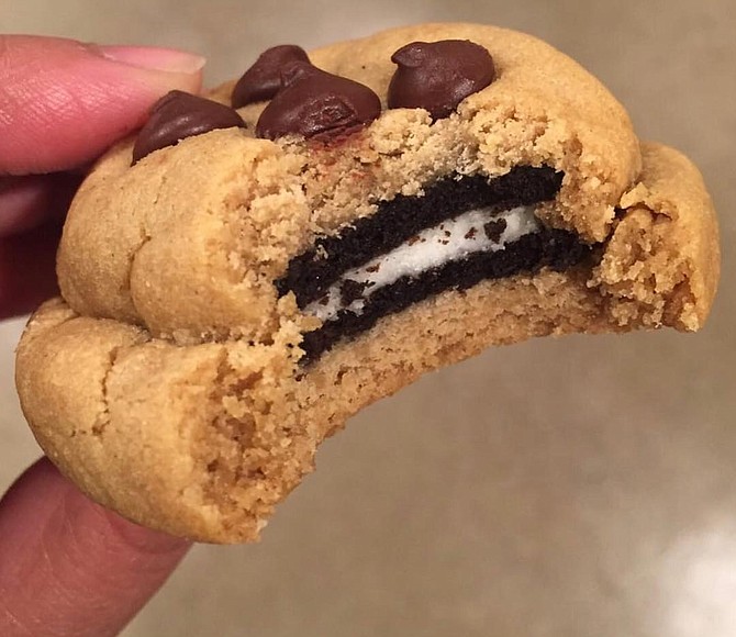 An Oreo stuffed peanut butter chocolate chip cookie as seen on the facebook page of Uncle Biff’s Killer Cookies