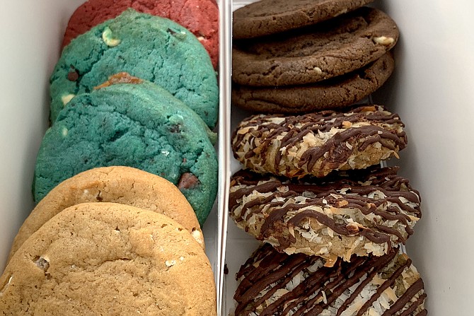 Cookies by The Cravory, including blue cookie monster cookies and almond joyous cookies (bottom right)