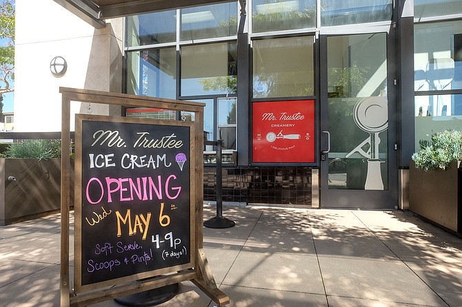 Opening day at a new sidewalk counter small batch ice cream shop
