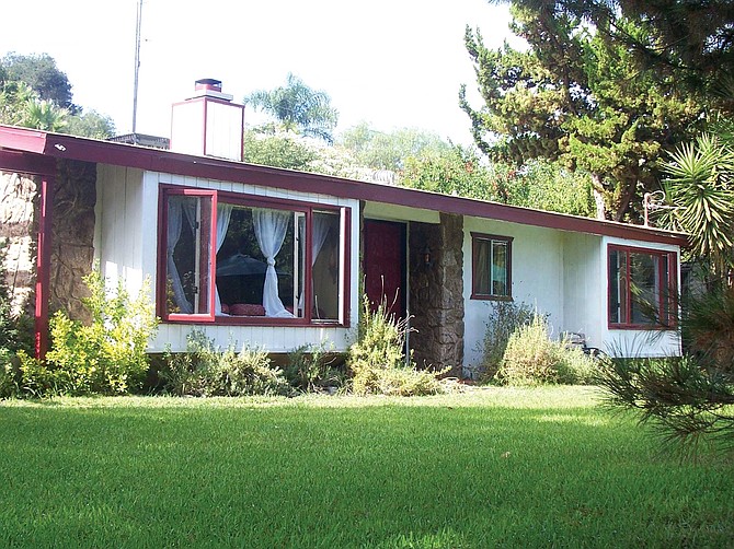 On a small knoll sat a 10-year-old ranch-style home. A pepper tree, a few squatty palms, and a pine tree lined the massive lawn. A “For Sale” sign hung out front. We bought the house, which we nicknamed The Reed Ranchito.