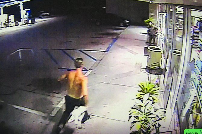 Surveillance video from AM/PM showed a shirtless man running toward the other man, about 1 am that day.