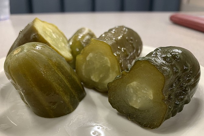 Complimentary pickles, an enjoyable part of the ritual of dining at D.Z. Akin's