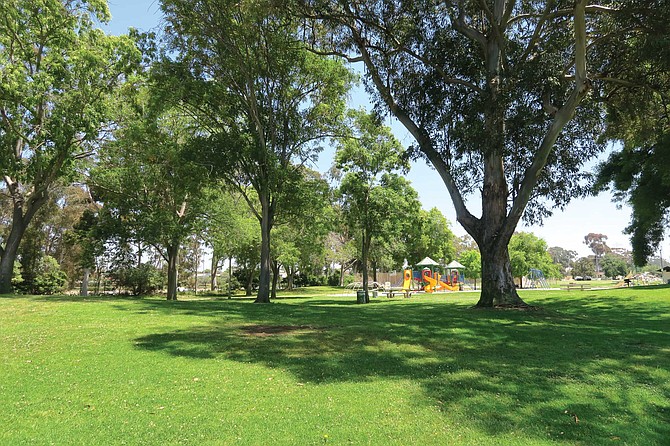 Lindbergh Neighborhood Park is a small park which butts against Interstate 805 just south of Balboa Avenue in Clairemont. The centerpiece is a playground set inside a large sandbox.