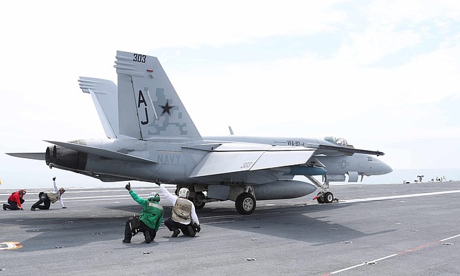 The president criticized General Atomics' costly electromagnetic catapult, featured on the USS Gerald R. Ford.