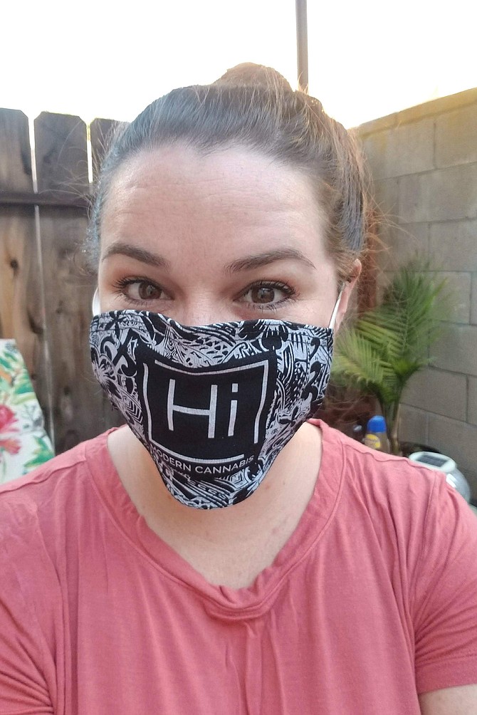 Mandy lets her bubbly personality shine through with her “Hi” mask.