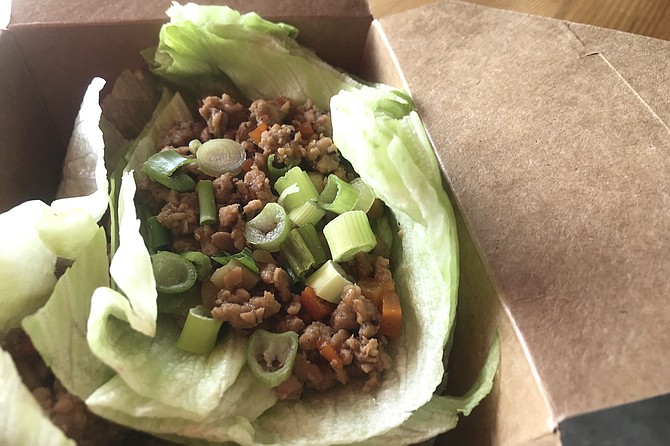 Chicken lettuce wrap: healthiest Thai alternative.