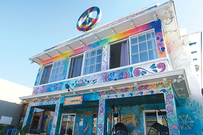 The Ocean Beach Youth Hostel is painted in bright colors like something out of a Ken Kesey book.