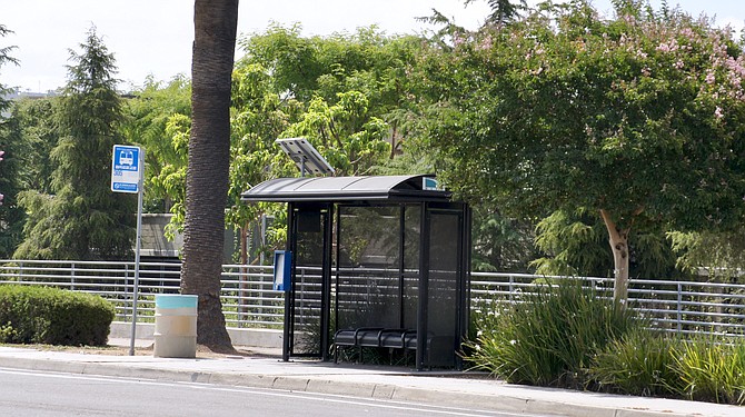 The bus stop at the corner of Pico Avenue.