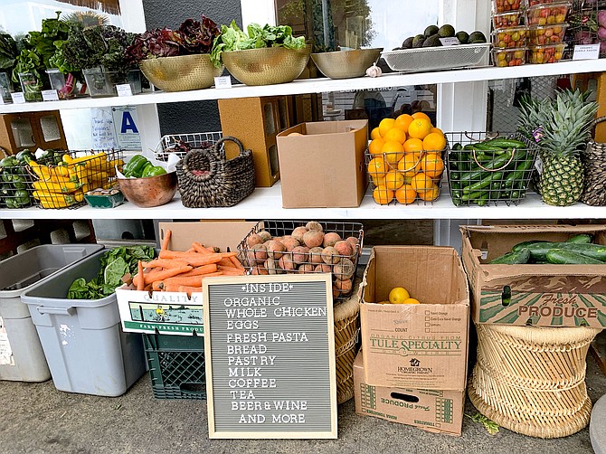 Organic produce, chicken, fresh pasta, and other provisions now being sold by wine bar and restaurant counter, Homestead