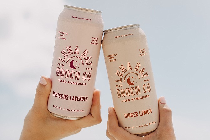 The cans say "Born in Chicago," but the idea for Luna Bay Booch was born in the waves of San Diego.
